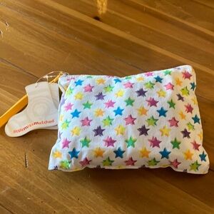 Little Miss Matched hearts and stars folded ballet flats with matching wristlet.